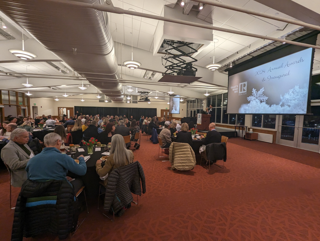 Inaugural and awards room with seated people